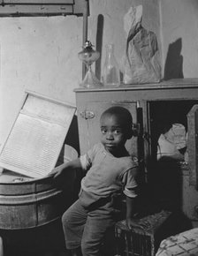 A young boy who lives near the nation's capitol, Washington, D.C, 1942. Creator: Gordon Parks.