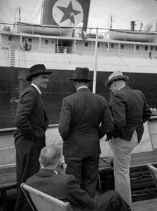 Businessmen on a ship in London docks, 1937. Artist: SW Rawlings