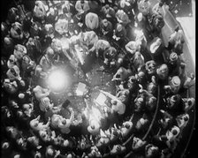 Crowd of Civilians Buying and Selling Stocks and Shares, 1932. Creator: British Pathe Ltd.