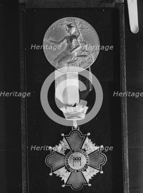 Medal from the 1928 Exposition internationale in Paris, between 1928 and 1942. Creator: Arnold Genthe.