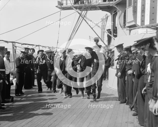 U.S.S. New York, 3 legged race, anniversary of Santiago, 1899 July 3. Creator: Unknown.