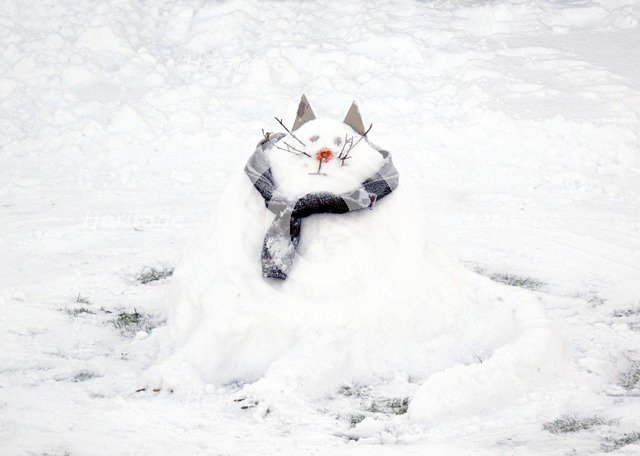 Snow scene with a 'snowcat' snowman, c2010. Artist: Peter Williams.