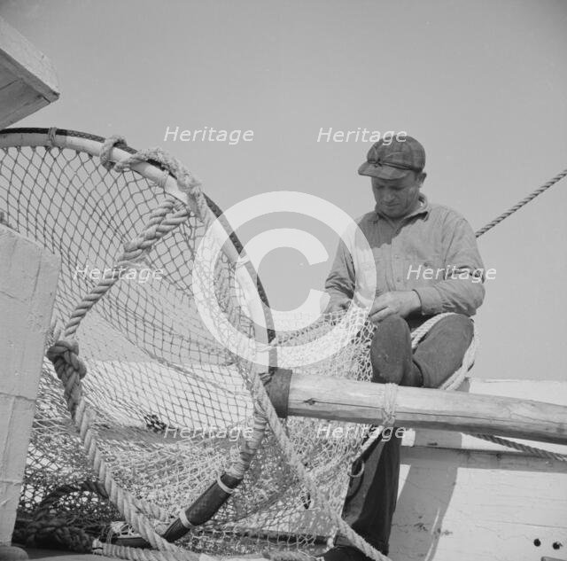 Frank Mineo, owner and skipper of the New England fishing boat..., Gloucester, Massachusetts, 1943. Creator: Gordon Parks.