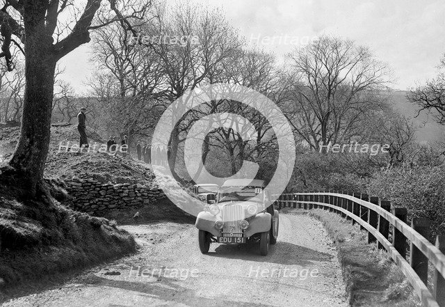Kay Petre's Singer Nine competing in the RAC Rally, 1939. Artist: Bill Brunell.