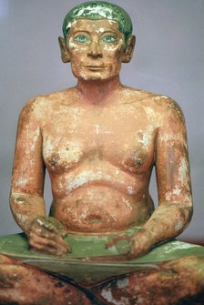 Egyptian seated scribe model. Artist: Unknown