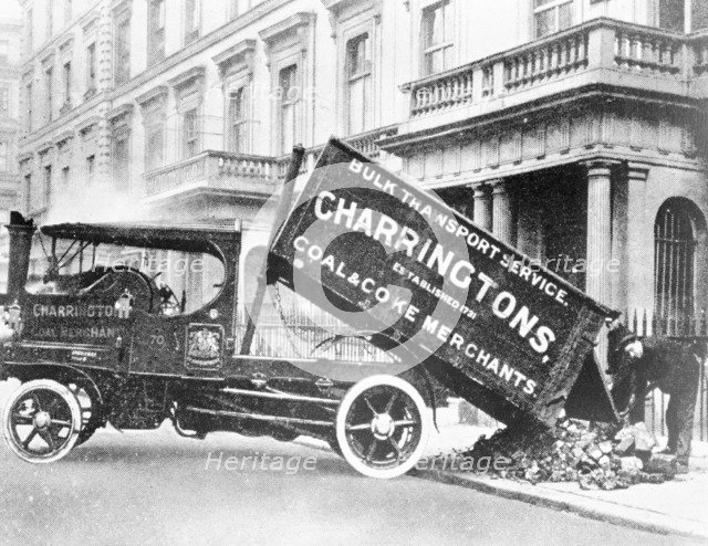 A Charrirngtons lorry unloading coal. Artist: Unknown