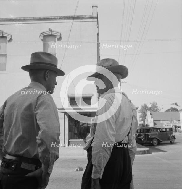 Possibly: Williamette Valley hop farmers in town hold their..., Independence, Oregon, 1939. Creator: Dorothea Lange.