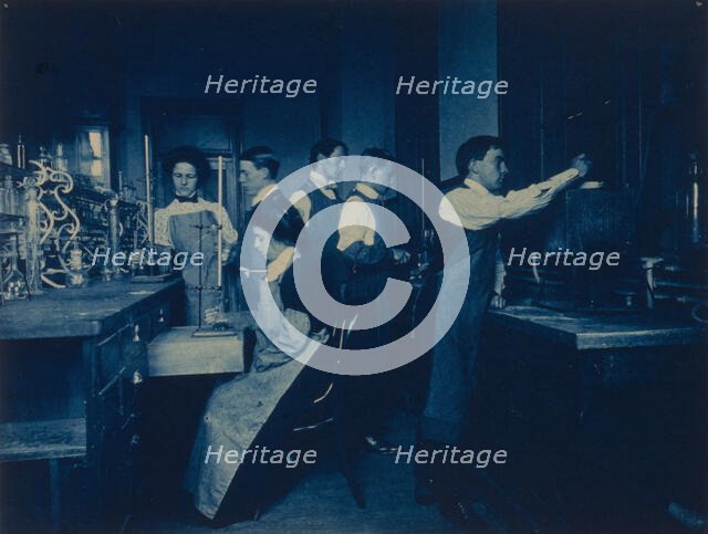 Students conducting experiments in laboratory, Western High School, Washington, D.C., (1899?). Creator: Frances Benjamin Johnston.
