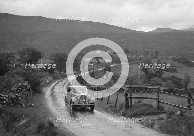 Rover of IH Mackay competing in the RSAC Scottish Rally, 1936. Artist: Bill Brunell.
