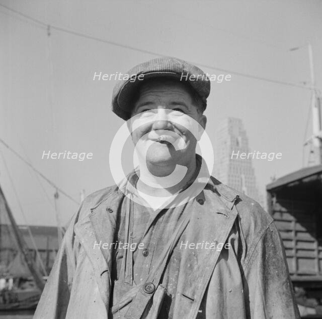 A Fulton fish market stevedore, New York, 1943. Creator: Gordon Parks.
