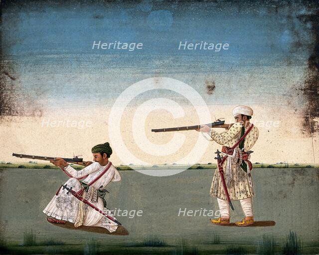 Two Indian soldiers (?) take aim and fire their rifles, (between 1800 and 1899?). Creator: Unknown.