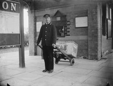 A porter at Charwelton Station, Northamptonshire, 1901. Artist: A Newton