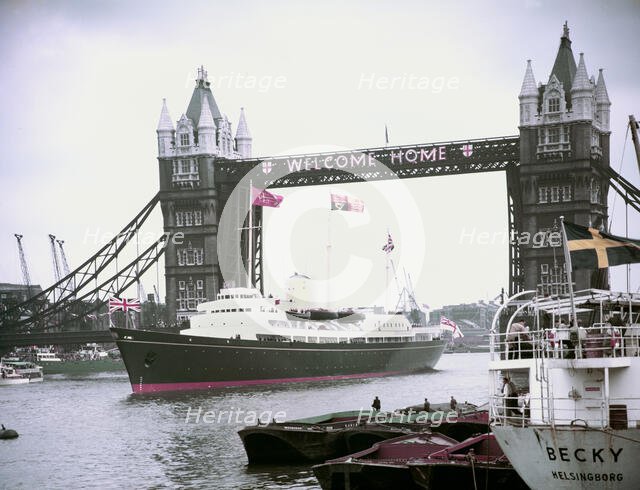 The Royal Yacht 'Britannia' passing under Tower Bridge, London, 15 May 1954. Creator: Arthur Charles Kirby Ware.