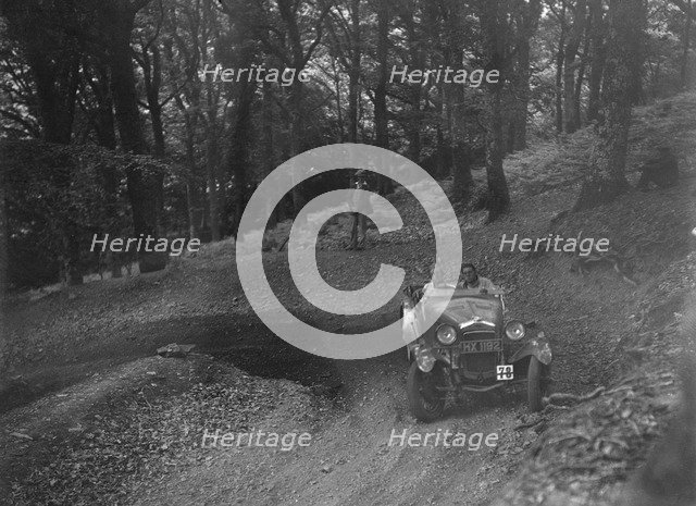 Frazer-Nash of Alan Whiddington, B&HMC Brighton-Beer Trial, Fingle Bridge Hill, Devon, 1934. Artist: Bill Brunell.