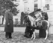 Quentin Roosevelt on pony in front of White House, 1900?. Creator: Frances Benjamin Johnston.