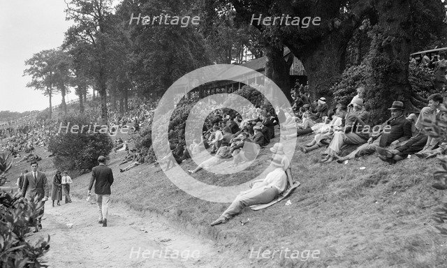Crowds attending a motor race at Brooklands. Artist: Bill Brunell.
