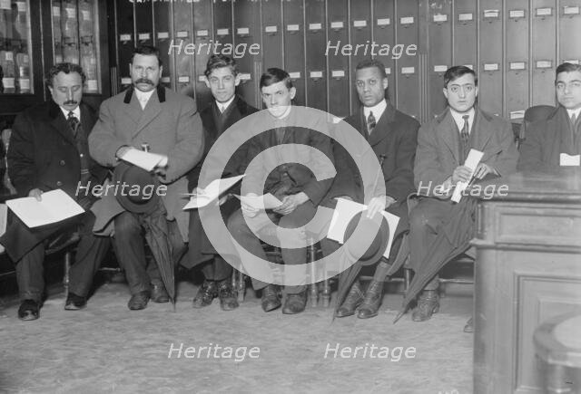 Candidates for naturalization seated with papers, 1910. Creator: Bain News Service.