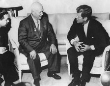President John F. Kennedy and Nikita Khrushchev at the US Embassy, Vienna, Austria, 1961. Artist: Unknown