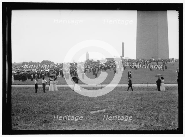 Crowd at base of Washington Monument, Washington, D.C., between 1909 and 1923. Creator: Harris & Ewing.
