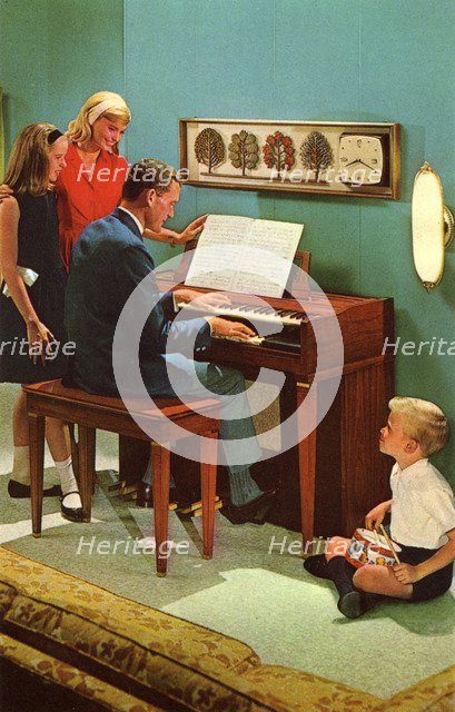 Family with a Wurlitzer 4040 organ, De Kalb, Illinois, USA, 1964. Artist: Unknown