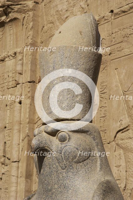 Statue of God Horus wearing the double crown..., Temple of Edfu, Egypt, Ptolemaic period, (2003).  Creator: LTL.