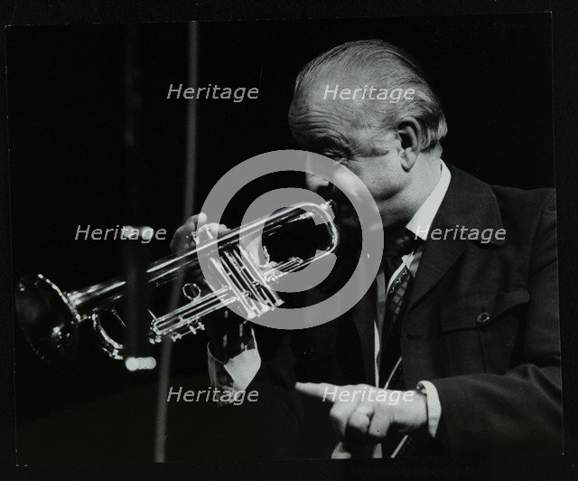 Trumpeter Kenny Baker playing at the Forum Theatre, Hatfield, Hertfordshire, 1978. Artist: Denis Williams