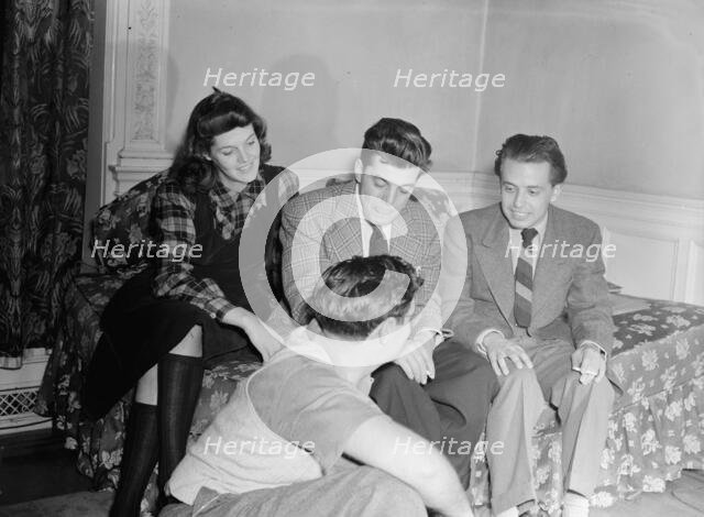 Portrait of Adele Girard, Joe Marsala, Nesuhi Ertegun, and William P. Gottlieb...Washington, ca1940. Creator: Delia Potofsky Gottlieb.