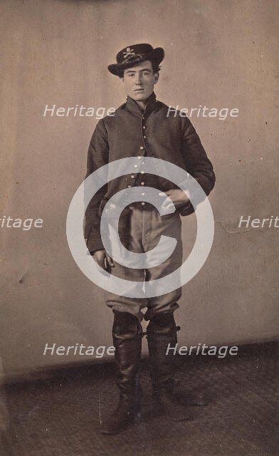 Union Cavalry Soldier with Pistol in Holster, 1861-65. Creator: Tappin's Photograph Art Gallery.