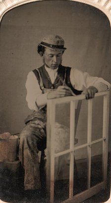Young Man Painting Window Frame, 1860s-80s. Creator: Unknown.