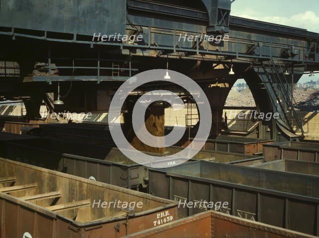 After the ore is weighed in the "Hewlett" [i.e. "Hulett"] machine it is...Cleveland, Ohio, 1943. Creator: Jack Delano.