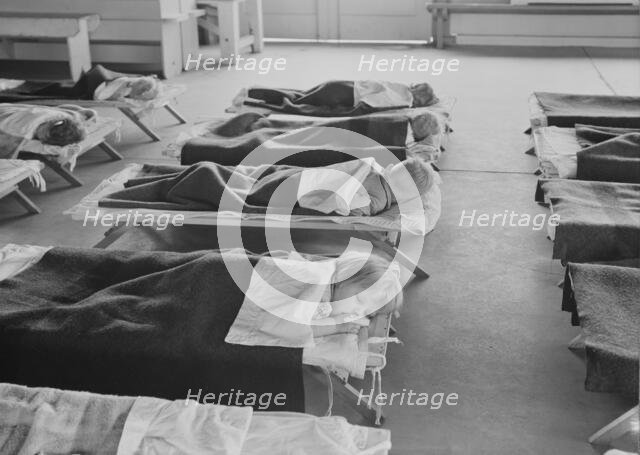 Rest time in nursery school for migrant children at Shafter Camp, California, 1939. Creator: Dorothea Lange.