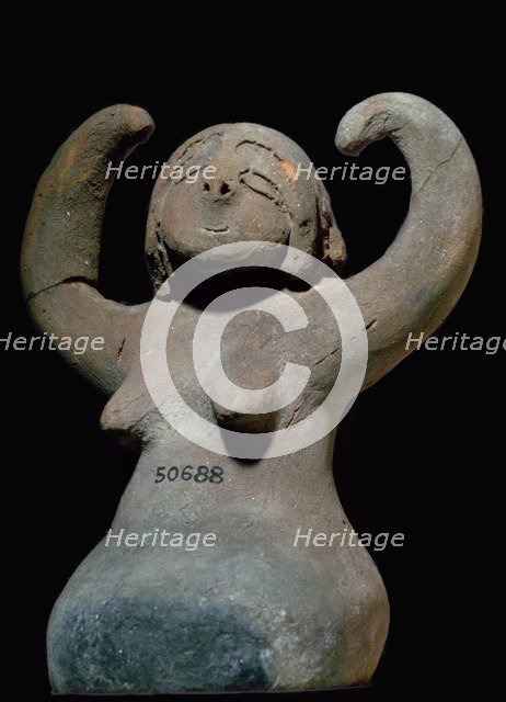 Egyptian figure of baked clay. Artist: Unknown