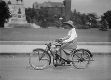 Woman On Bicycle, 1917 or 1918. Creator: Unknown.