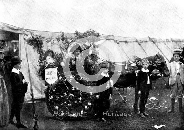 The Royal Botanic Society's Fête in Regent's Park: the Children's Parade..., 1898. Creator: Russell & Sons.