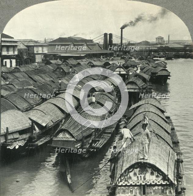 'A Busy Scene on the Pasig River, Manila, Island of Luzon, P.I. - Cascos, the Cargo Lighters and Coa Creator: Unknown.