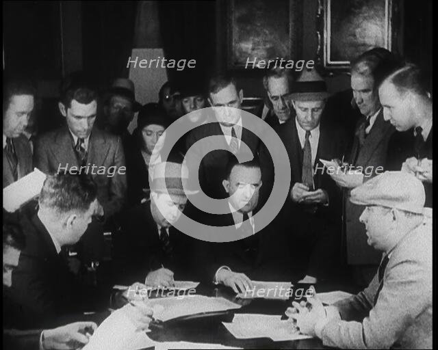A Group of Male American Civilians in a Press Room, 1930s. Creator: British Pathe Ltd.
