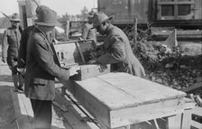 Yaphank, examining packages, 11 Sept 1917. Creator: Bain News Service.