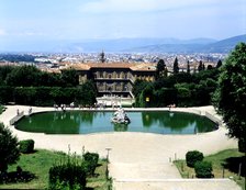 Pitti Palace, built according to plans by Brunelleschi with the city of Florence at background an…