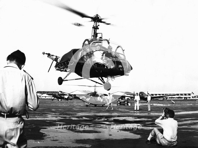 Helicopter landing at Tan Son Nhut Air Base, Saigon, Vietnam, 1953. Artist: Unknown