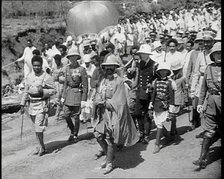 Haile Selassie I, Emperor of Ethiopia Walking with a Crowd, 1930s. Creator: British Pathe Ltd.