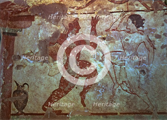Burial chamber of the necropolis of Tarquinia, mural painting representing two dancers.