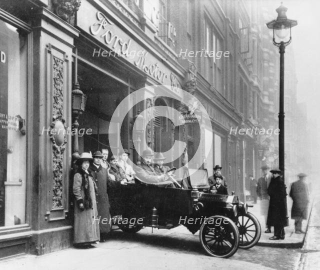 Ford Model T leaving showroom circa 1911. Creator: Unknown.