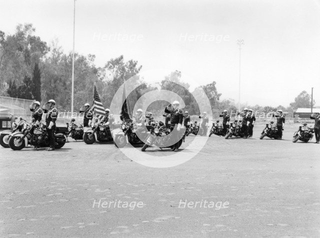 A police patrol with their Harley-Davidsons, America. Artist: Unknown
