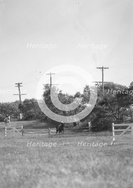 Horse show or show jumping event, between 1911 and 1942. Creator: Arnold Genthe.