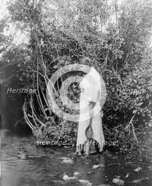 At the water's edge-Arikara, c1908. Creator: Edward Sheriff Curtis.