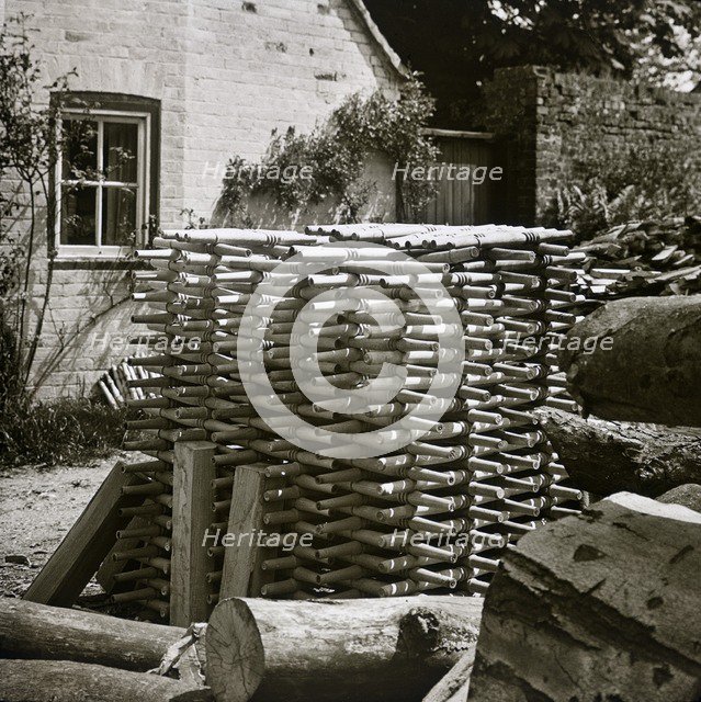 Stack of turned chair legs, Turville, Buckinghamshire, early 20th century. Artist: Unknown.