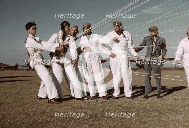 Instructor explaining the operation of the parachute to students, Fort Worth, Tex., 1942. Creator: Arthur Rothstein.