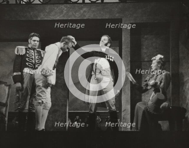 Man touching another man's head, 1938. Creator: Unknown.