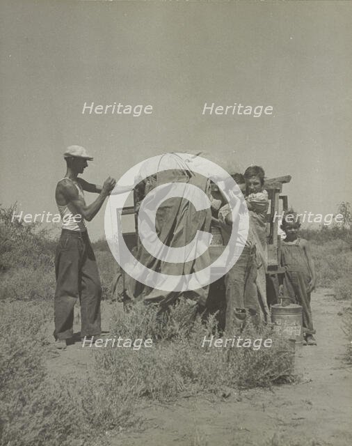 A tubercular painter from Iowa and part of his family... penniless in New Mexico, 1937. Creator: Dorothea Lange.