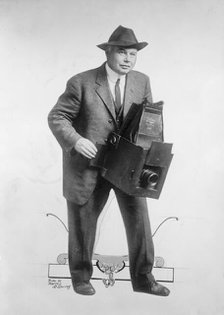 Photographer with Large Format Camera, 1914. Creator: Harris & Ewing.